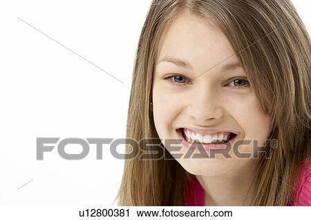 Stock Image - Studio Portrait of Smiling Teenage Girl. Fotosearch