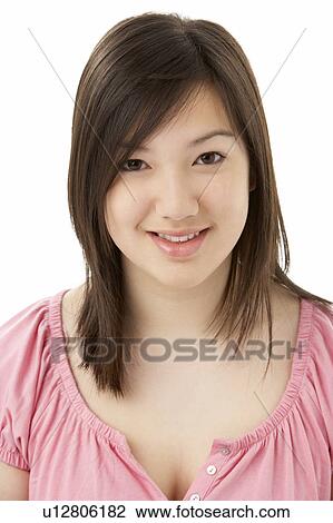 Stock Image - Studio Portrait of Smiling Teenage Girl. Fotosearch