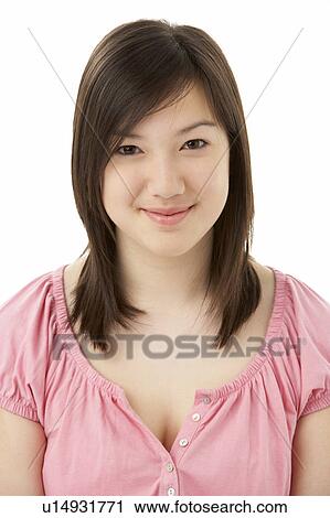 Stock Image - Studio Portrait of Smiling Teenage Girl. Fotosearch