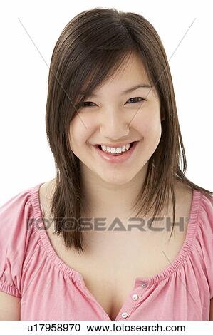 Stock Image - Studio Portrait of Smiling Teenage Girl. Fotosearch