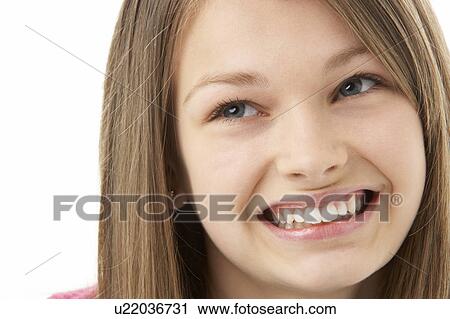 Studio Portrait of Smiling Teenage Girl View Large Photo Image Stock Image - Studio Portrait of Smiling Teenage Girl. Fotosearch