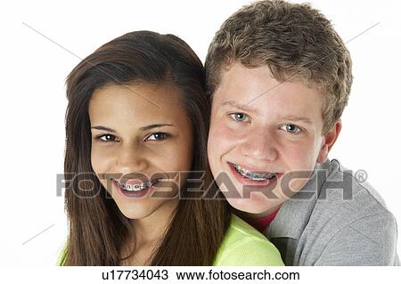 Stock Image - Teenage Couple in Studio. Fotosearch