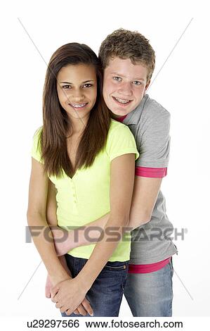 Stock Photograph - Teenage Couple in Studio. Fotosearch