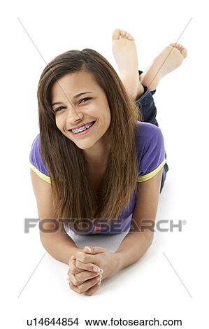 Teenage Girl Laying on Stomach View Large Photo Image Picture - Teenage Girl Laying on Stomach. Fotosearch