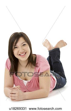 Teenage Girl Laying on Stomach View Large Photo Image Stock Image - Teenage Girl Laying on Stomach. Fotosearch