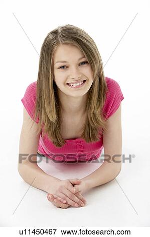 Teenage Girl Laying on Stomach View Large Photo Image Stock Photo - Teenage Girl Laying on Stomach. Fotosearch