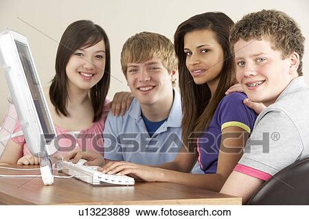 Stock Photo - Teenagers on Computer at Home. Fotosearch