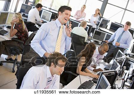 View Of Busy Stock Traders Office View Large Photo Image Stock Image - View Of Busy Stock Traders Office. Fotosearch