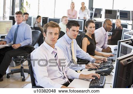 View Of Busy Stock Traders Office View Large Photo Image Stock Photo - View Of Busy Stock Traders Office. Fotosearch