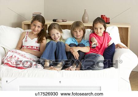 Young Children Watching Television at Home View Large Photo Image Stock Image - Young Children Watching Television at Home. Fotosearch