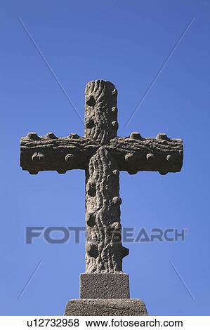 Stock Photo - Cement cross in a cemetery; Laval, Quebec, Canada. Fotosearch