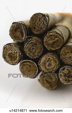Stock Image - Cheroot, homemade hilltribe cigarettes. Fotosearch