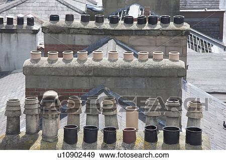Chimney pots; Newcastle upon Tyne, Northumberland, England View Large Photo Image Stock Photo - Chimney pots; Newcastle upon Tyne, Northumberland, England. Fotosearch