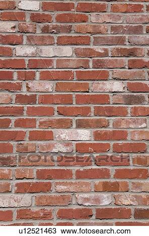 Close-up of a uneven colored brick wall View Large Photo Image Stock Image - Close-up of a uneven colored brick wall. Fotosearch