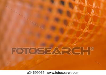 Stock Photography - Close up of orange fabric. Fotosearch