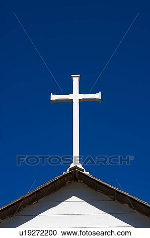Stock Image - Cross on steeple of church. Fotosearch