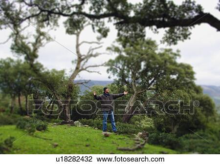 Stock Image - Man with arms raised. Fotosearch