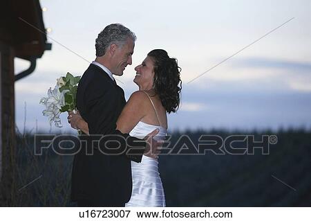Stock Photo - Middle aged couple getting married. Fotosearch