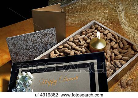Stock Image - Box with nuts. Fotosearch