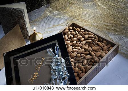 Stock Image - Box with nuts. Fotosearch