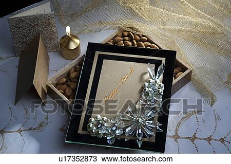 Stock Image - Box with nuts. Fotosearch