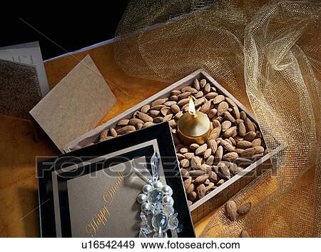Stock Photo - Box with nuts. Fotosearch