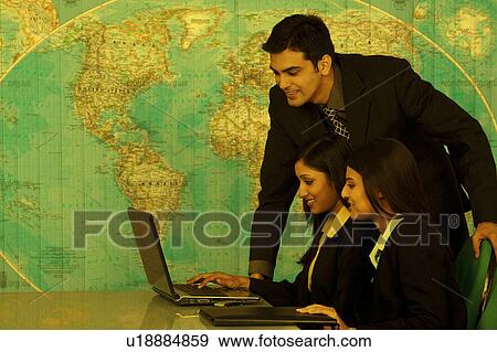 Stock Photo - Businesspeople in the office. Fotosearch