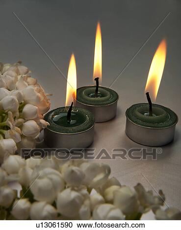 Candles and flowers View Large Photo Image Stock Image - Candles and flowers. Fotosearch
