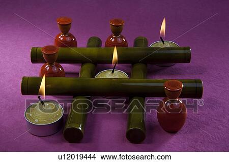 Candles in a decorative style View Large Photo Image Picture - Candles in a decorative style. Fotosearch