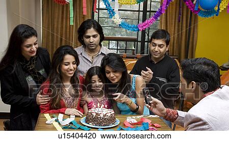 Celebrating a birthday View Large Photo Image Stock Image - Celebrating a birthday. Fotosearch