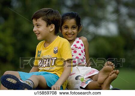 Stock Photo - Children at a picnic. Fotosearch