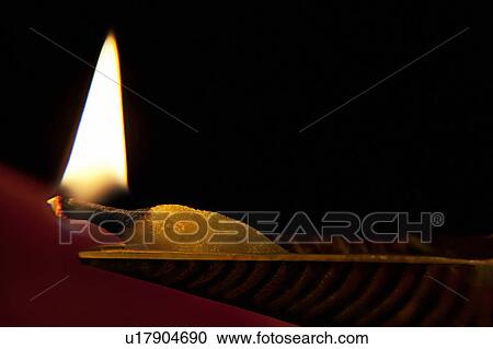 Stock Image - Close-up of a diya. Fotosearch