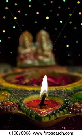 Stock Photo - Close-up of a diya. Fotosearch