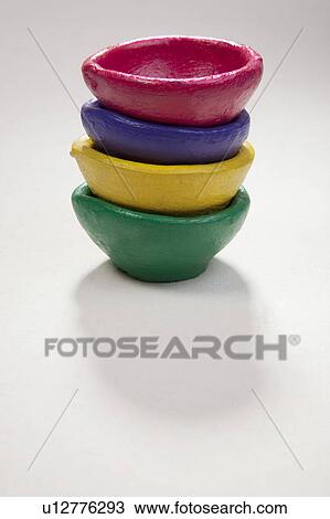 Stock Image - Colourful diyas. Fotosearch
