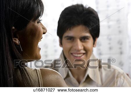 Couple enjoying a meal View Large Photo Image Stock Photo - Couple enjoying a meal . Fotosearch