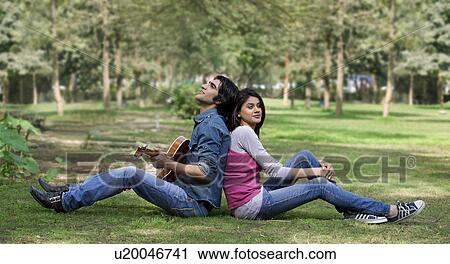 Stock Image - Couple relaxing. Fotosearch