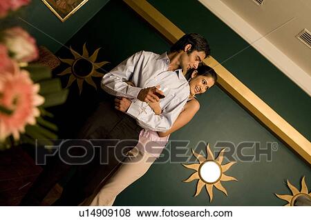 Couple standing together View Large Photo Image Stock Photo - Couple standing together. Fotosearch