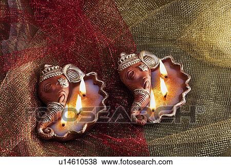 Stock Photo - Decorative diyas. Fotosearch