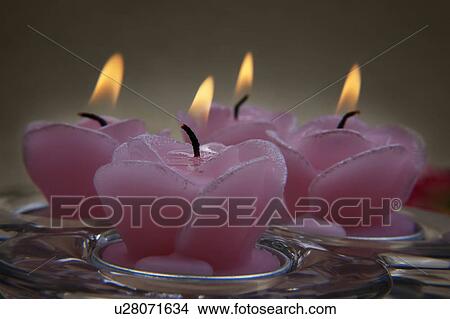Picture - Decorative pink candles. Fotosearch