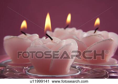Stock Image - Decorative pink candles. Fotosearch