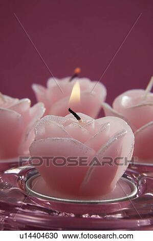 Stock Image - Decorative pink candles. Fotosearch