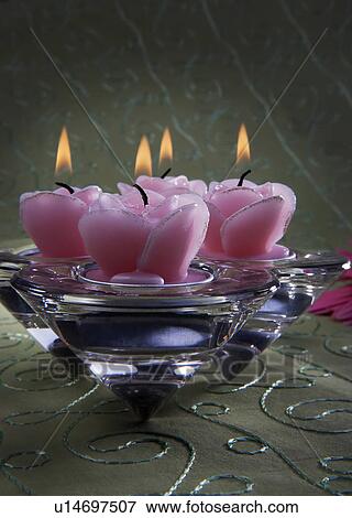 Stock Photo - Decorative pink candles. Fotosearch