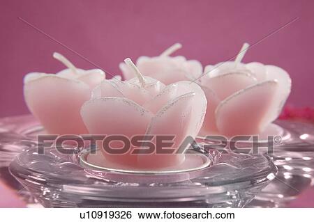Stock Photograph - Decorative pink candles. Fotosearch