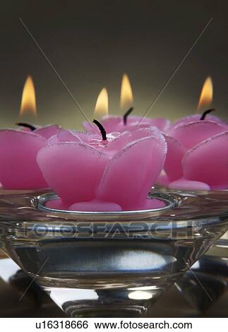 Stock Photograph - Decorative pink candles. Fotosearch