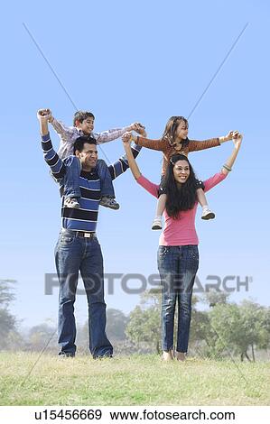 Stock Photo - Family enjoying themselves. Fotosearch