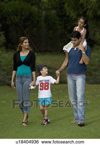 Stock Photograph - Family going for a walk. Fotosearch