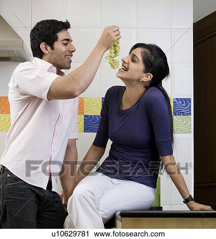 Feeding grapes View Large Photo Image Stock Image - Feeding grapes. Fotosearch