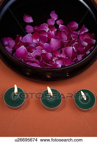Picture - Flower petals and candles. Fotosearch