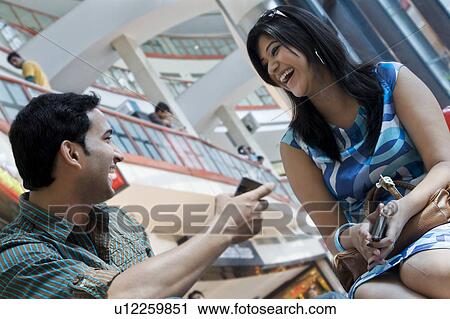 Stock Image - Friends having a great time. Fotosearch