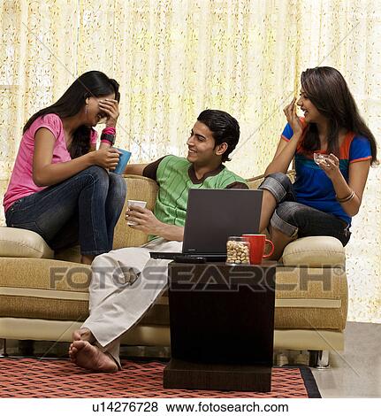 Stock Photo - Friends having a great time. Fotosearch